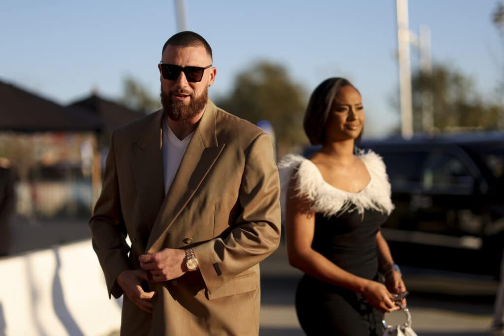 Travis Kelce and girlfriend, Kayla Nicole, arrive to the NFL Honors show at the YouTube Theater on February 10, 2022 in Inglewood, California.
