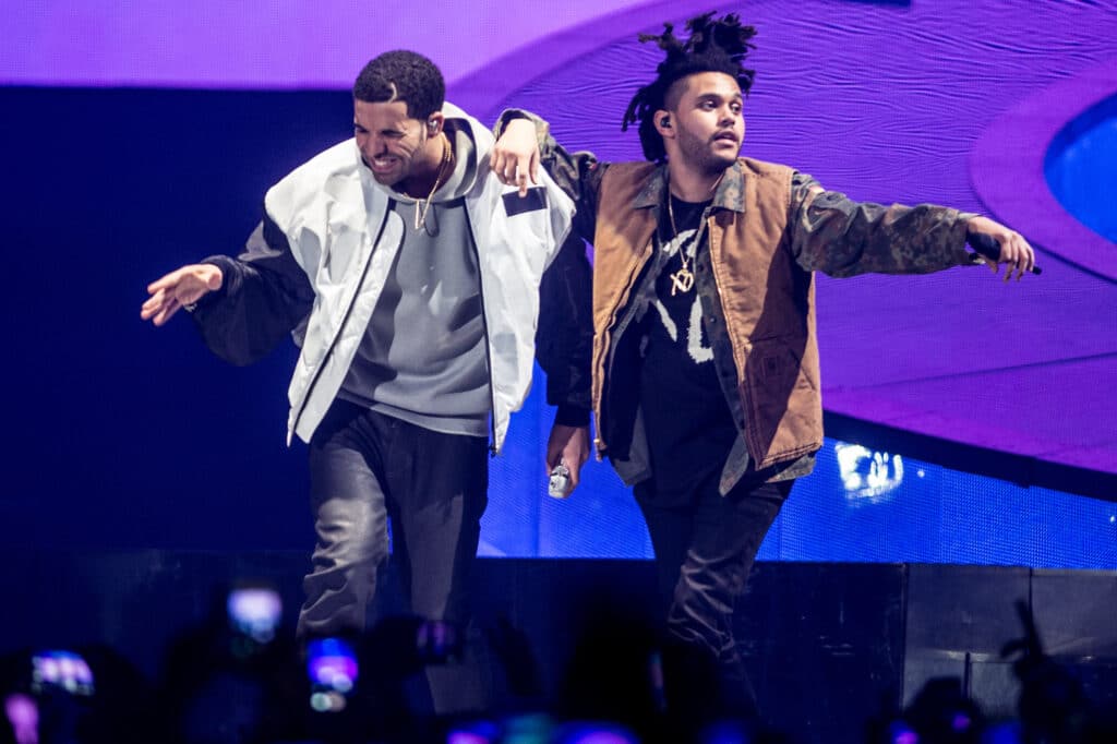 Drake and The Weeknd perform onstage during a date of Drakes "Nothing Was the Same" 2014 World Tour at Nottingham Capital FM Arena on March 16, 2014 in Nottingham, England.