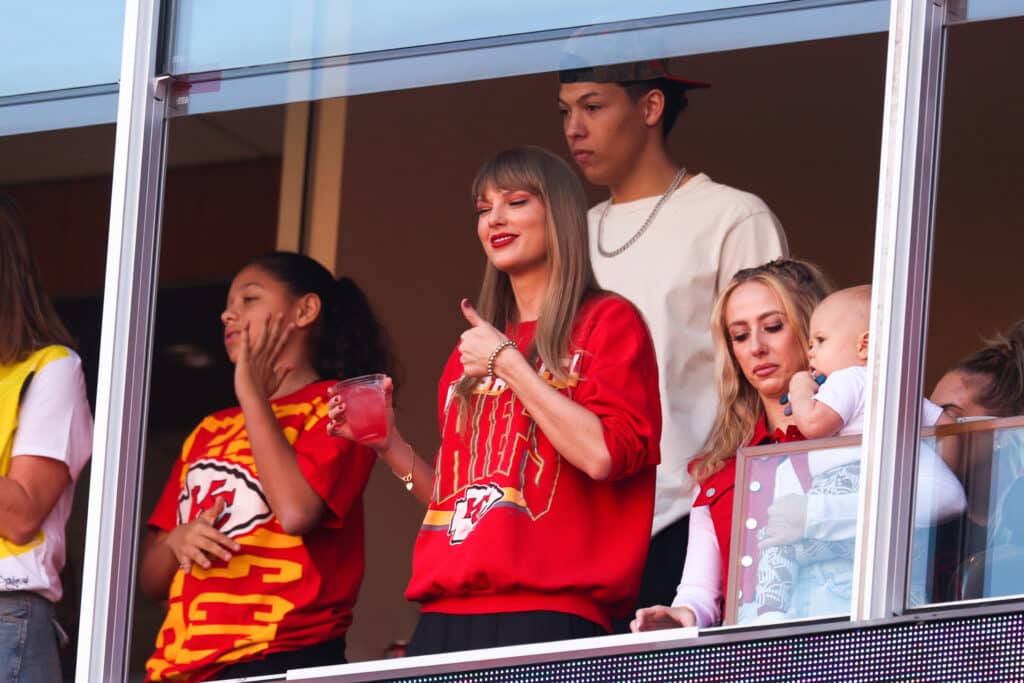 Taylor Swift reacts during a game between the Los Angeles Chargers and Kansas City Chiefs at GEHA Field at Arrowhead Stadium on October 22, 2023 in Kansas City, Missouri.