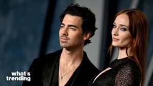 Joe Jonas and Sophie Turner posing at a formal event with a "what's trending" logo in the corner.