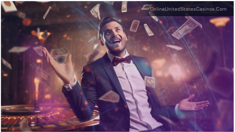 Man in suit and bow tie celebrating with money falling around him at a casino table