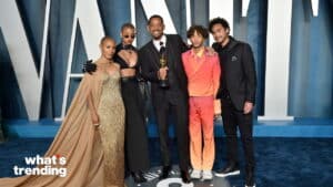 Will Smith holding an Oscar with Jada Pinkett Smith, Willow Smith, Jaden Smith, and Trey Smith at a Vanity Fair event.