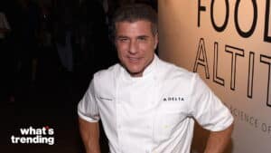 Chef Michael Chiarello wearing a Delta-branded chef coat at a food event.
