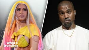 Karol G with long pink and yellow hair and yellow outfit, and Kanye West in white shirt with gold chain.