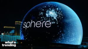 The Sphere entertainment venue in Las Vegas lit up with fireworks and the text "what's trending" at night.