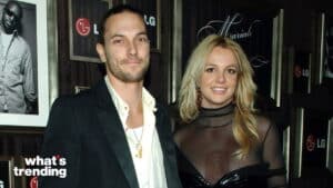 Kevin Federline and Britney Spears posing at an event with LG branding in the background