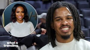 Man with dreadlocks smiling in a stadium with inset of woman in white lace top at a VH1 event