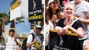 SAG-AFTRA members holding strike signs and protesting for labor rights outdoors