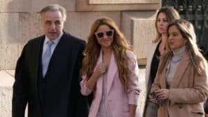 Colombian singer Shakira (2nd-L) arrives with her lawyer Pau Molins (L) at the High Court of Justice of Catalonia for her trial on tax fraud, in Barcelona on November 20, 2023. Colombian superstar Shakira goes on trial in Barcelona today in a tax fraud case, with Spanish prosecutors seeking a jail term of over eight years for the Grammy-winning singer. They accuse the 46-year-old of defrauding the Spanish state of 14.5 million euros ($15.7 million) on income earned between 2012 and 2014, charges denied by the singer who says she only moved to Spain full time in 2015. (Photo by Pau BARRENA / AFP)