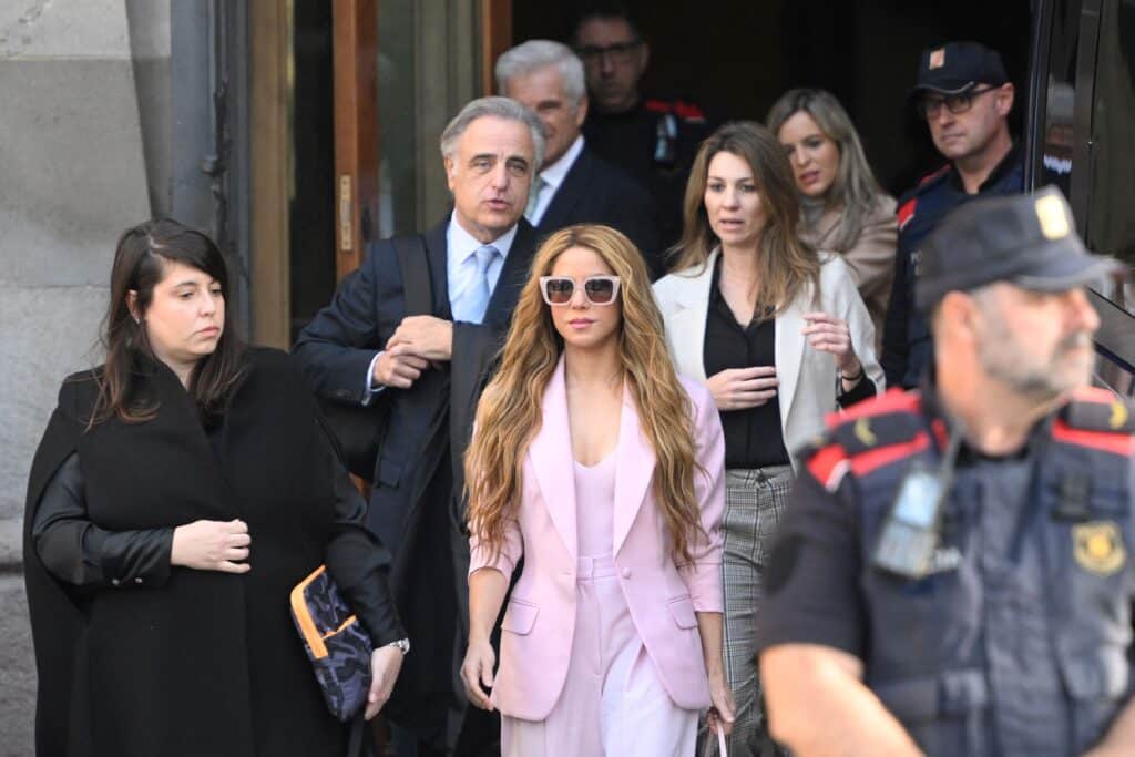 Colombian singer Shakira (C) leaves the High Court of Justice of Catalonia after attending her trial on tax fraud, in Barcelona on November 20, 2023. Colombian superstar Shakira has reached a deal with prosecutors to end her trial for allegedly defrauding the Spanish state of 14.5 million euros ($15.7 million) on income earned between 2012 and 2014, a Barcelona court said. Under the deal, the 46-year-old agreed to receive a three-year suspended sentence in exchange for paying millions of euros in fines, the head of the court said on what would have been the first day of her trial.
