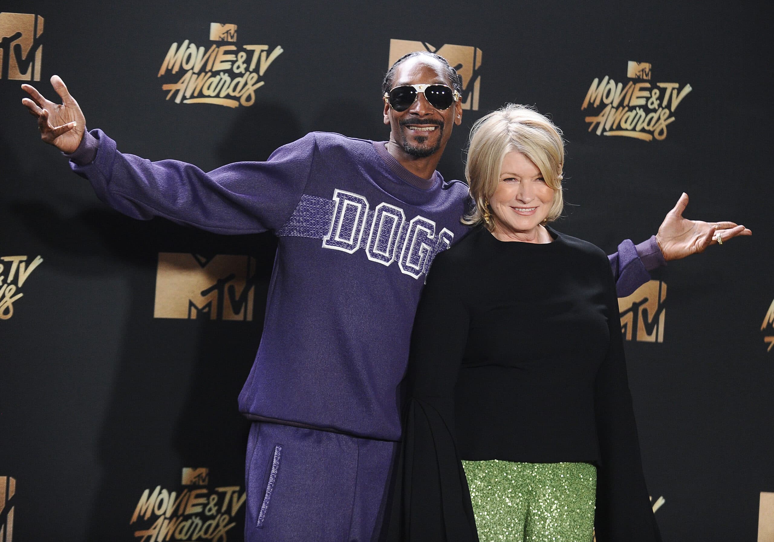 LOS ANGELES, CA - MAY 07: Snoop Dogg and Martha Stewart pose in the press room at the 2017 MTV Movie and TV Awards at The Shrine Auditorium on May 7, 2017 in Los Angeles, California.