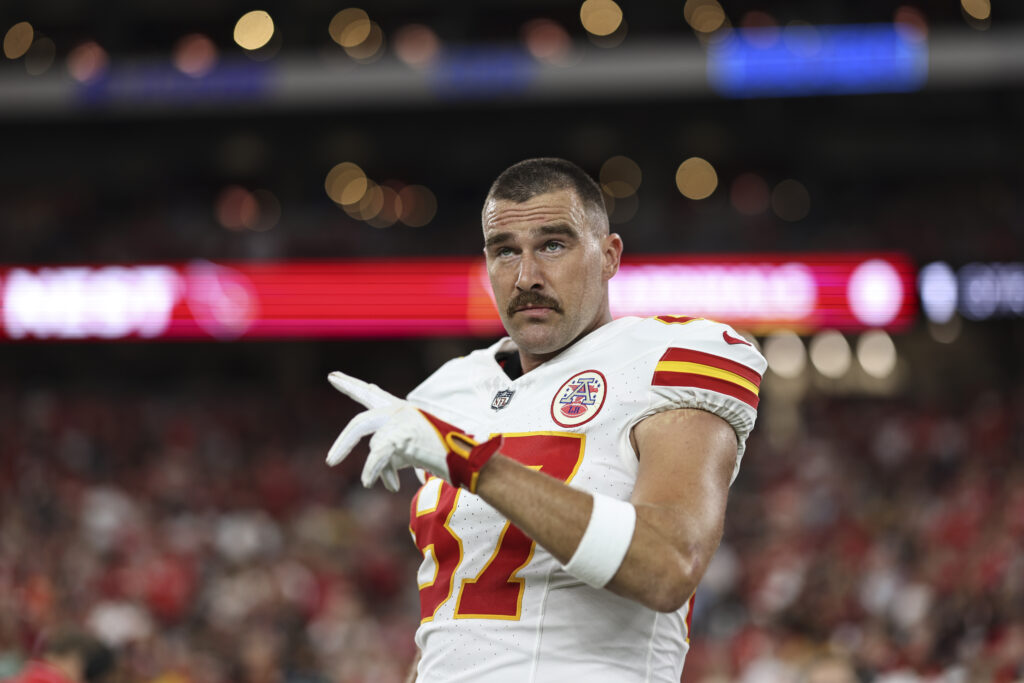 Travis Kelce #87 of the Kansas City Chiefs reacts prior to an NFL preseason football game between the Arizona Cardinals and the Kansas City Chiefs at State Farm Stadium on August 19, 2023 in Glendale, Arizona.