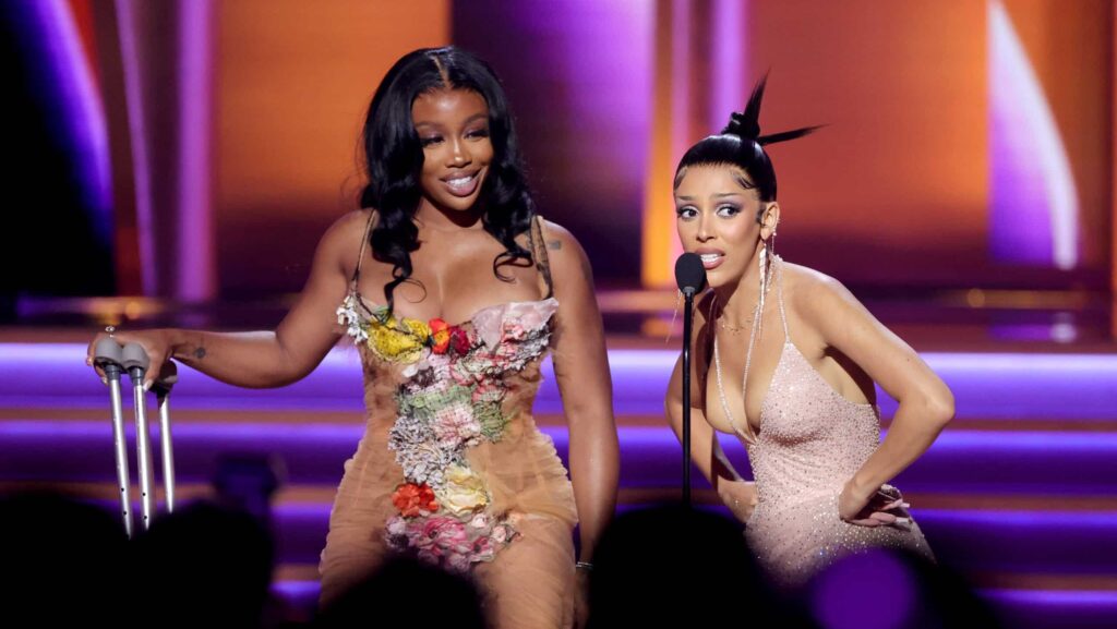 SZA and Doja Cat accept the Best Pop Duo/Group Performance award for ‘Kiss Me More’ onstage during the 64th Annual GRAMMY Awards at MGM Grand Garden Arena on April 03, 2022 in Las Vegas, Nevada.