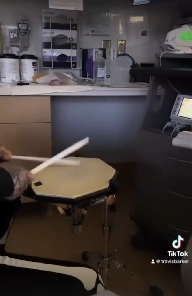 The musician played on a drum pad while Kourtney Kardashian was in labor.