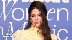 Lana Del Rey wearing a yellow lace dress at the Billboard Women in Music event.