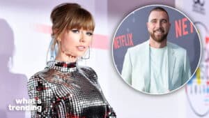Taylor Swift in a silver reflective dress and a smiling man in a white blazer at a Netflix event.