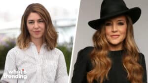 Sofia Coppola in a striped shirt and a woman with long wavy hair wearing a black hat and black top