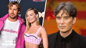 Ryan Gosling and Margot Robbie posing at CinemaCon, with Cillian Murphy in a black suit on the right side