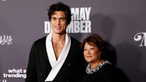 Henry Golding and Lorraine Pascale posing at the May December premiere event