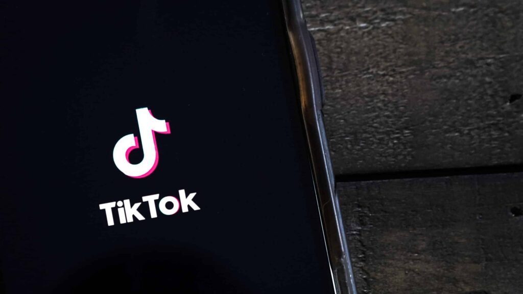 WASHINGTON, DC - AUGUST 07: In this photo illustration, the TikTok app is displayed on an Apple iPhone on August 7, 2020 in Washington, DC. On Thursday evening, President Donald Trump signed an executive order that bans any transactions between the parent company of TikTok, ByteDance, and U.S. citizens due to national security reasons. The president signed a separate executive order banning transactions with China-based tech company Tencent, which owns the app WeChat. Both orders are set to take effect in 45 days.