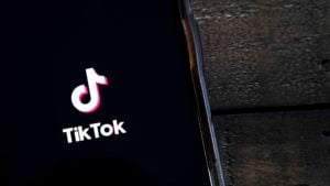 WASHINGTON, DC - AUGUST 07: In this photo illustration, the TikTok app is displayed on an Apple iPhone on August 7, 2020 in Washington, DC. On Thursday evening, President Donald Trump signed an executive order that bans any transactions between the parent company of TikTok, ByteDance, and U.S. citizens due to national security reasons. The president signed a separate executive order banning transactions with China-based tech company Tencent, which owns the app WeChat. Both orders are set to take effect in 45 days.
