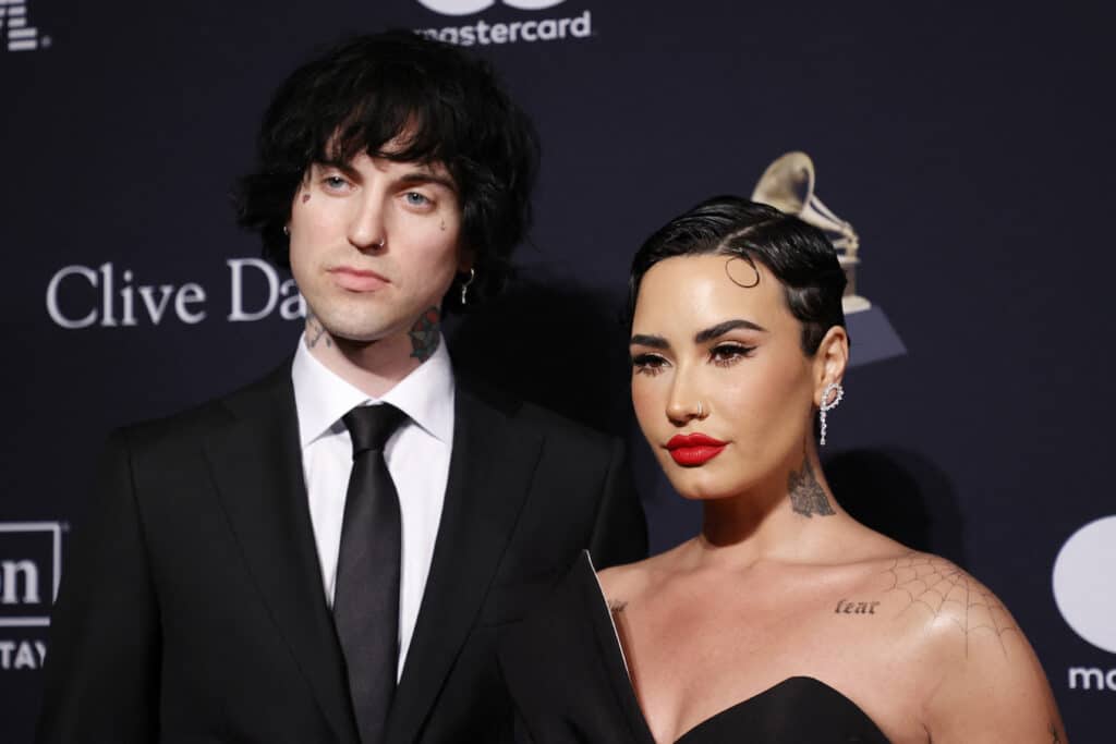 Jordan Lutes (L) and US singer-songwriter Demi Lovato arrive for the Recording Academy and Clive Davis pre-Grammy gala at the Beverly Hilton hotel in Beverly Hills, California on February 4, 2023.