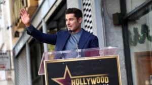 US actor Zac Efron poses speaks during his Hollywood Walk of Fame ceremony in Hollywood, California, December 11, 2023.