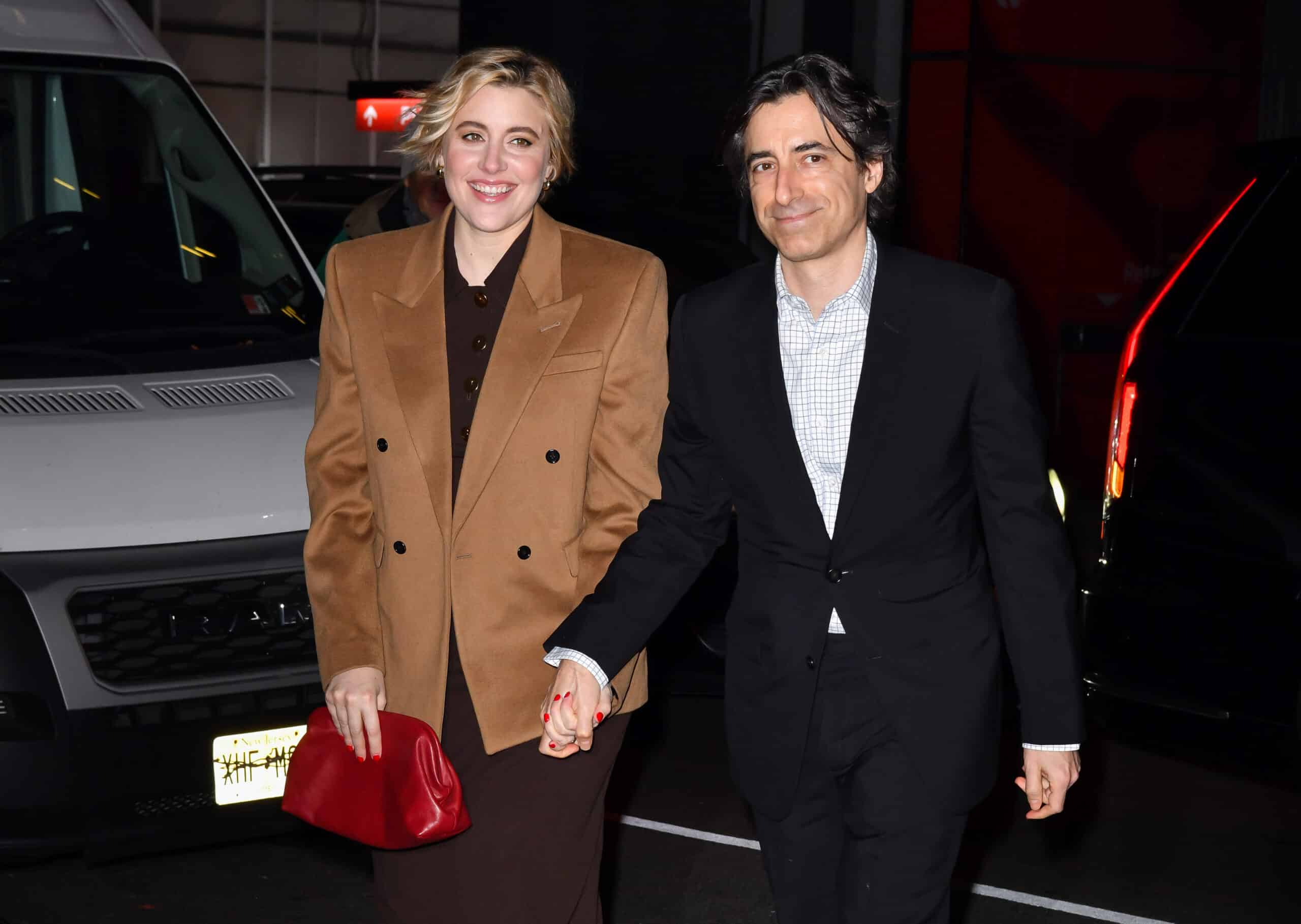 NEW YORK, NEW YORK - DECEMBER 13: Greta Gerwig and Noah Baumbach arrive to the "The Boys In The Boat" New York Screening at Museum of Modern Art on December 13, 2023 in New York City.