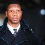 NEW YORK, NEW YORK - DECEMBER 15: Actor Jonathan Majors leaves the courthouse following closing arguments in Majors' domestic violence trial at Manhattan Criminal Court on December 15, 2023 in New York City. Majors had plead not guilty but faces up to a year in jail if convicted on misdemeanor charges of assault and harassment of an ex-girlfriend.