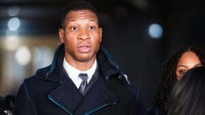 NEW YORK, NEW YORK - DECEMBER 15: Actor Jonathan Majors leaves the courthouse following closing arguments in Majors' domestic violence trial at Manhattan Criminal Court on December 15, 2023 in New York City. Majors had plead not guilty but faces up to a year in jail if convicted on misdemeanor charges of assault and harassment of an ex-girlfriend.