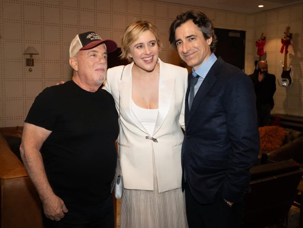 NEW YORK, NEW YORK - DECEMBER 19: (EXCLUSIVE COVERAGE) (L-R) Billy Joel, Greta Gerwig and Noah Baumbach seen backstage at Madison Square Garden on December 19, 2023 in New York City.