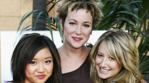 HOLLYWOOD, CA - JULY 27: Actresses Kim Rhodes (centre), Brenda Song (left) and Ashely Tisdale (right) arrive for the Disney Channel Original Movies Los Angeles premiere of "Tiger Cruise" held on July 27, 2004 at the Directors Guild of America, in Hollywood, California.