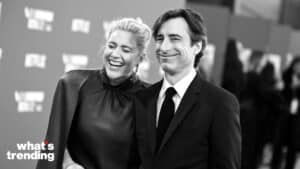 Actors Greta Gerwig and Noah Baumbach smiling at a Netflix event
