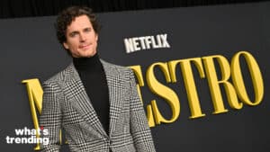 Actor Matt Bomer in a black turtleneck and checkered blazer at the Netflix Maestro premiere.