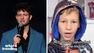 Comedian holding microphone on stage next to child in hoodie saying "Actually it's Saturn that has the rings."
