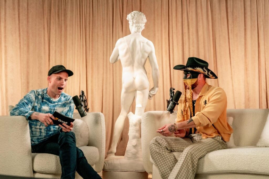 Orville Peck pictured with Katya Zamolodchikova on Grindr's podcast 'Who's The Asshole?"