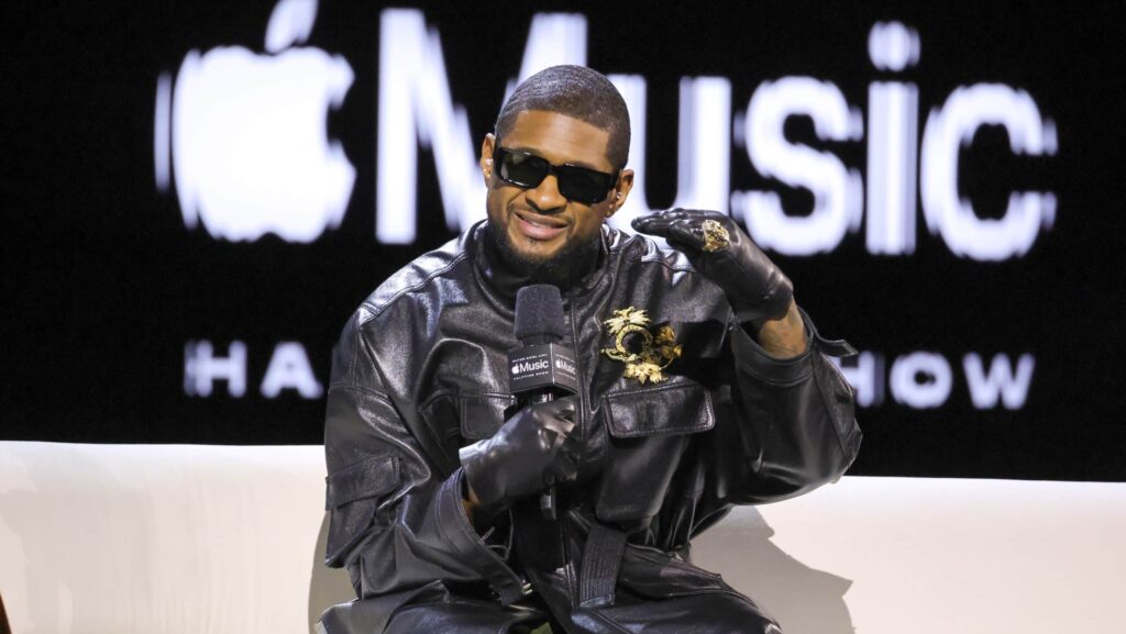 Usher speaks onstage during the Super Bowl LVIII Pregame & Apple Music Super Bowl LVIII Halftime Show press conference at the Mandalay Bay Convention Center on February 08, 2024 in Las Vegas, Nevada. 