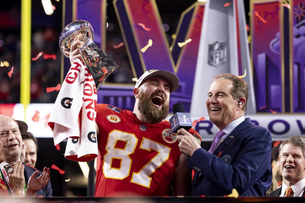 Travis Kelce #87 of the Kansas City Chiefs celebrates with the Vince Lombardi Trophy following the NFL Super Bowl 58 football game between the San Francisco 49ers and the Kansas City Chiefs at Allegiant Stadium on February 11, 2024 in Las Vegas, Nevada.