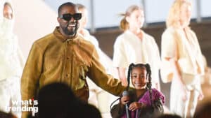 PARIS, FRANCE - MARCH 02: Kanye West and his daughter North West who sings on the runway during the "Yeezy Season 8" show as part of the Paris Fashion Week Womenswear Fall/Winter 2020/2021 on March 02, 2020 in Paris, France. (Photo by Stephane Cardinale - Corbis/Corbis via Getty Images)