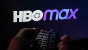 TV remote control is seen with HBO Max logo displayed on a screen in this illustration photo taken in Krakow, Poland on February 6, 2022.