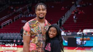 HOUSTON, TEXAS - DECEMBER 28: Simone Biles and Jonathan Owens attend a game between the Houston Rockets and the Los Angeles Lakers at Toyota Center on December 28, 2021 in Houston, Texas. NOTE TO USER: User expressly acknowledges and agrees that, by downloading and or using this photograph, User is consenting to the terms and conditions of the Getty Images License Agreement. (Photo by Carmen Mandato/Getty Images)