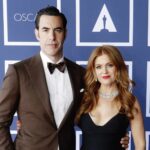 Sacha Baron Cohen (L) and Isla Fisher attend a screening of the Oscars on Monday, April 26, 2021 in Sydney, Australia.