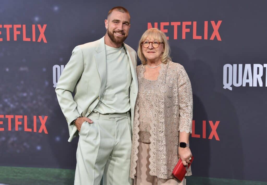 Kansas City Chief's football tight end Travis Kelce (L) and his mom Donna Kelce arrive for the premiere of Netflix's docuseries "Quarterback" at the Tudum Theatre in Los Angeles, on July 11, 2023.