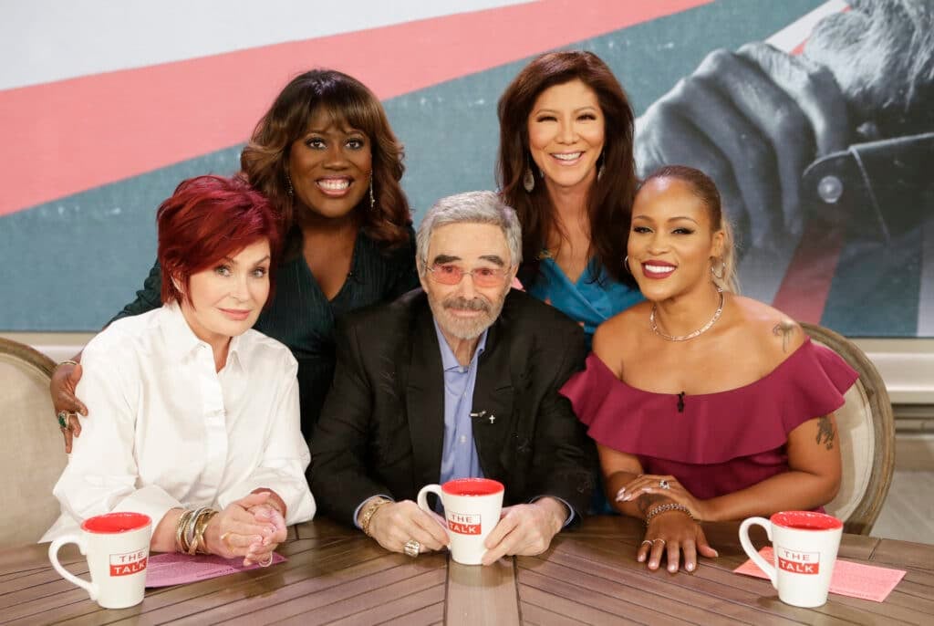 Actor Burt Reynolds discusses his new film "The Last Movie Star" on "The Talk," Monday, March 26, 2018 on the CBS Television Network. From left, Sheryl Underwood, Sara Gilbert, Burt Reynolds, Sharon Osbourne, Eve and Julie Chen, shown.