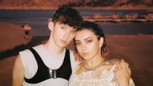 Charli XCX pictured with Troye Sivan.