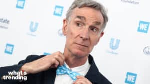 Bill Nye flexes his classic bowtie while arriving at WE Day California, in Inglewood Los Angeles.
