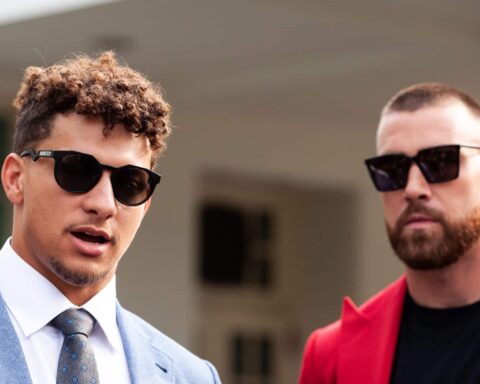 Kansas City Chiefs quarterback Patrick Mahomes (left) and tight end Travis Kelce speak to reporters following a White House celebration of the team's 2023 Super Bowl championship. In a long-standing White House tradition, President Joe Biden is hosting championship-winning teams in collegiate and professional sports.