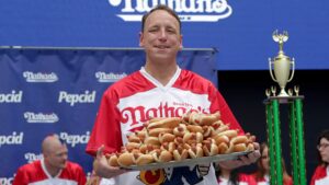Competitive eaters participated in a weigh-in ceremony before the Nathan's Famous 4th of July hot dog eating contest on July 3, 2023 in New York City. Competitive eaters Joey Chestnut, Michelle Lesco, Miki Sudo and Nick Wehry posed for photos during the event. The event was emceed by George Shea, co-founder of Major League Eating. Eating 76 hot dogs and buns in 10 minutes is currently the record held by World champion Joey Chestnut. Eating 48 hot dogs and buns in 10 minutes is currently the record held by competitive eater Miki Sudo. Nathan's employee's displayed hot dogs in those amounts.