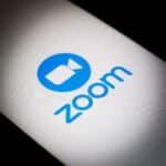 The Zoom logo is being displayed on a smartphone screen in Athens, Greece, on December 24, 2023.