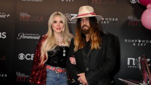 Firerose and Billy Ray Cyrus arriving at Dolly